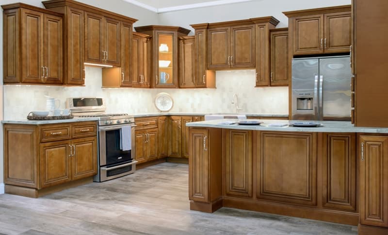 Traditional stained kitchen cabinets with a center island