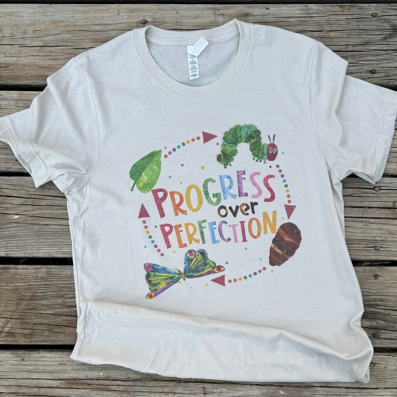 Introducing Progress Over Perfection, a Bella Canvas Teacher T-Shirt that truly captures the motivational spirit. Made from soft, natural materials, this shirt is the perfect way to inspire and uplift teachers on their journey towards success. Show your dedication to progress, not perfection, with this must-have shirt.

Printed on a Bella Canvas Natural