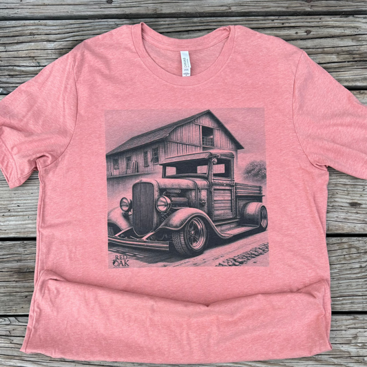 Rev up your style with our Old Truck Rebuild Graphic T-Shirt! Perfect for any old truck enthusiast, this tee features a bold graphic of a vintage truck and a rustic barn. Show off your love for adventure and dare to stand out in this unique t-shirt.

Sublimation print on a Bella Canvas Sunset 50/50 poly/cotton blend.