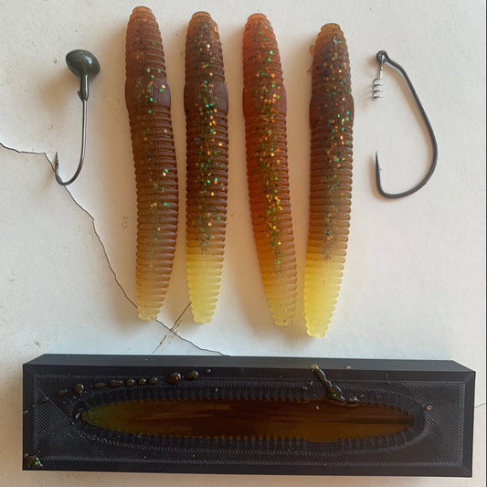 Open Top Lure Mold and a Package of Recycled Hand Poured Cigar Grub Baits - pour you own baits - recycle used or old plastic lures